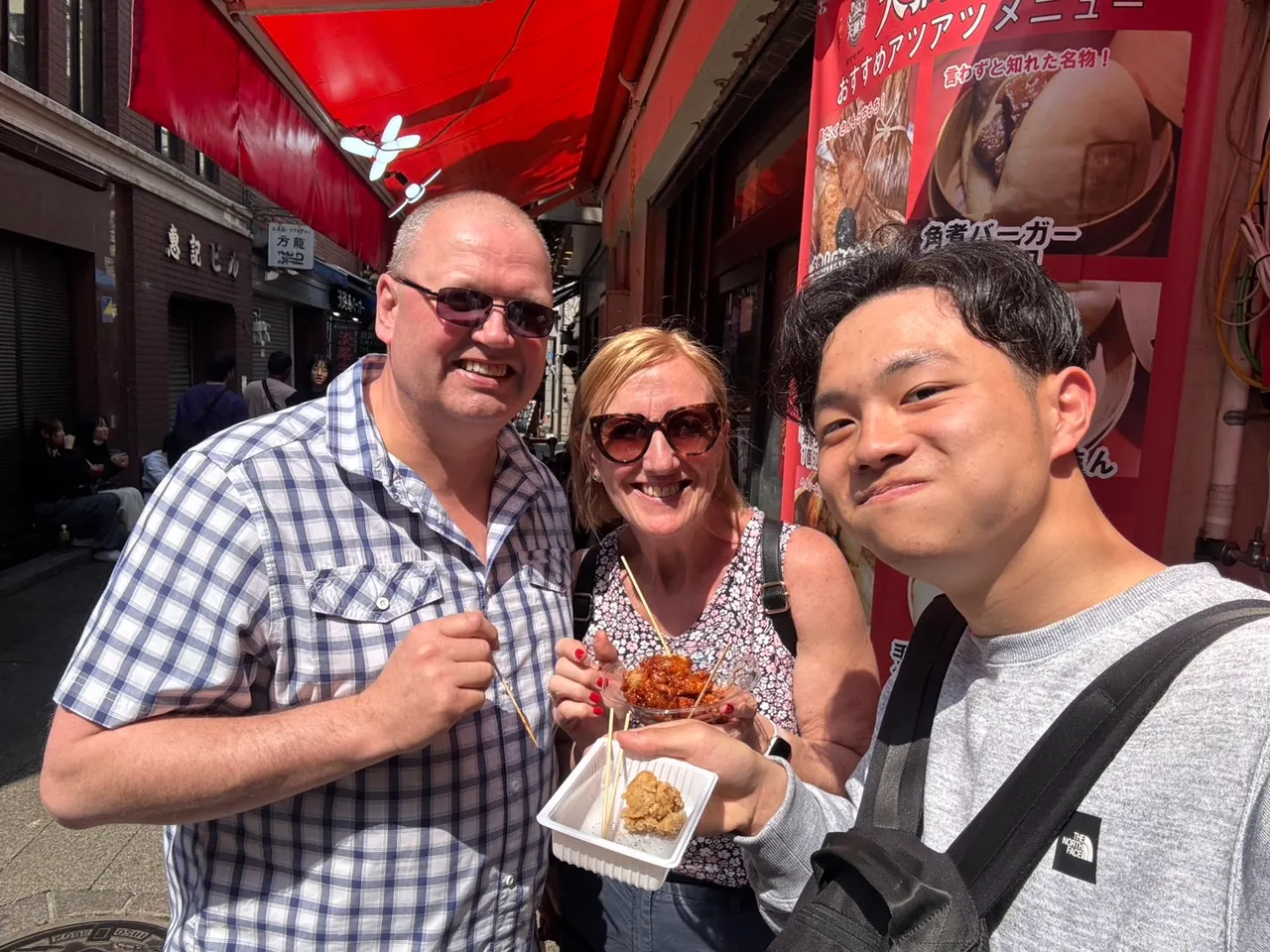 A LinkRoots student guide exploring Kobe with guests